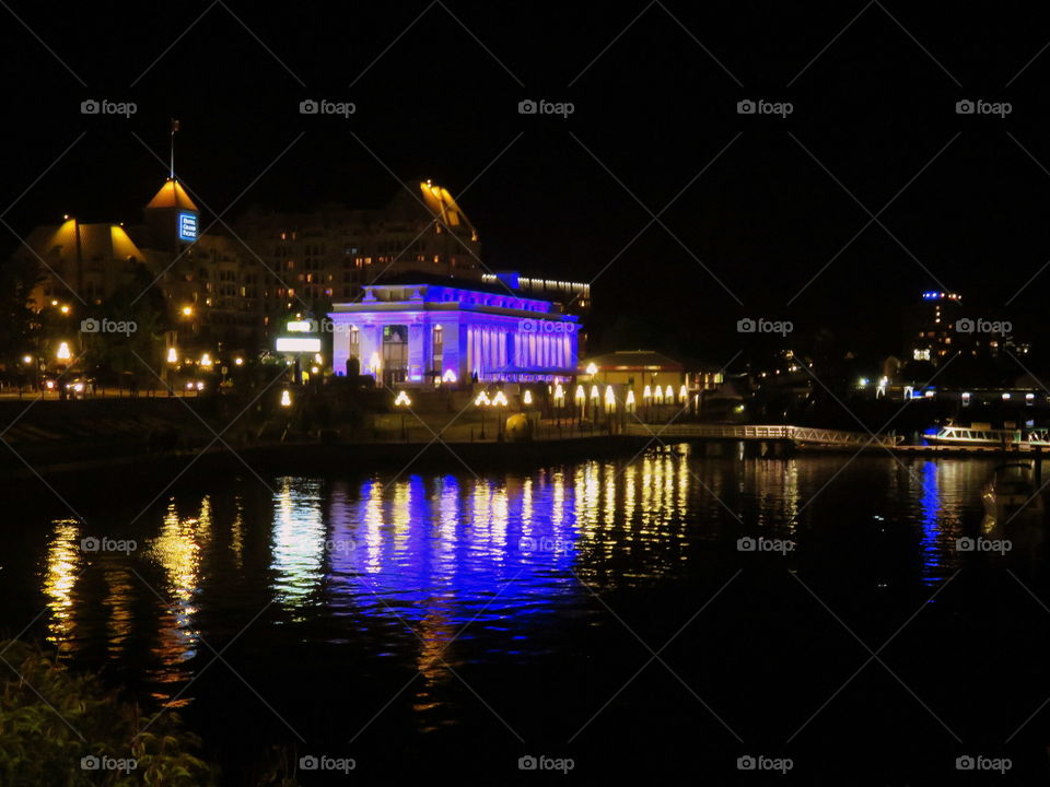 colored structures reflecting into the water