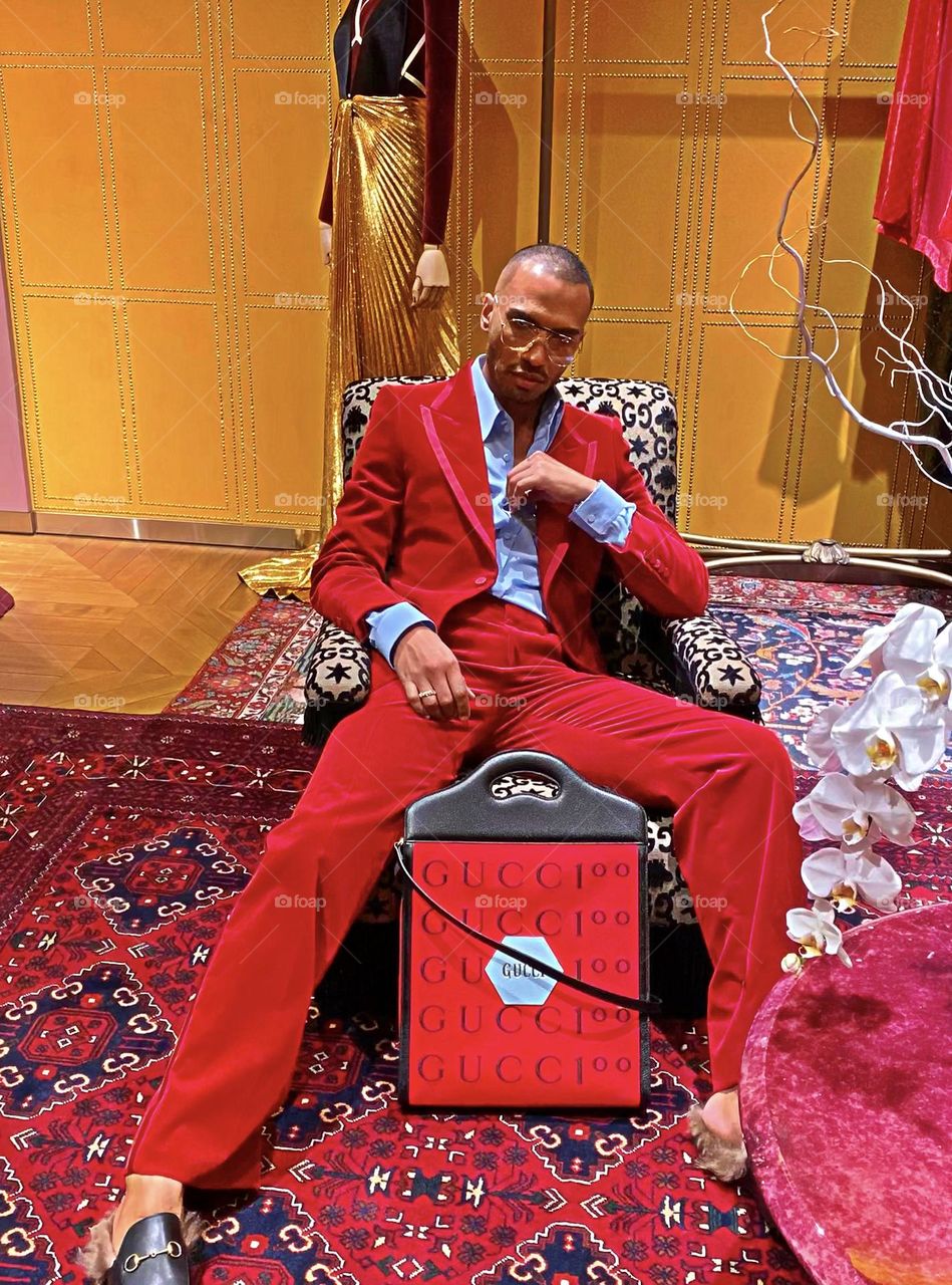 THE GUCCI BOY IN RED , fashionable and stylish