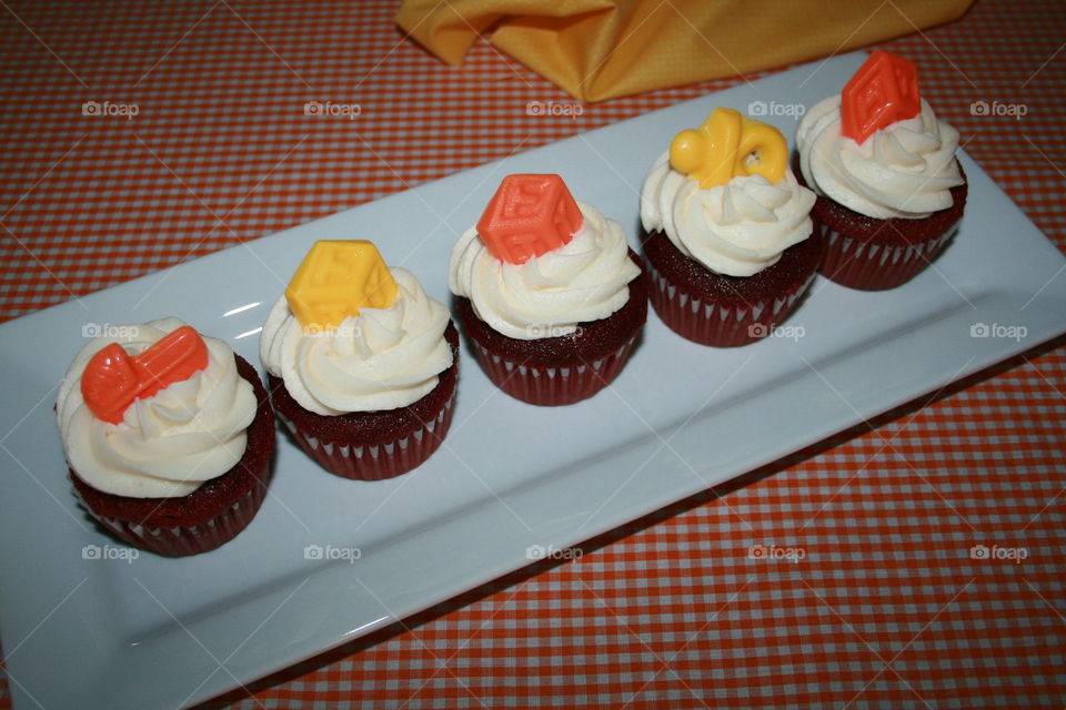 All in a Row. Red velvet cupcakes with buttercream icing. 