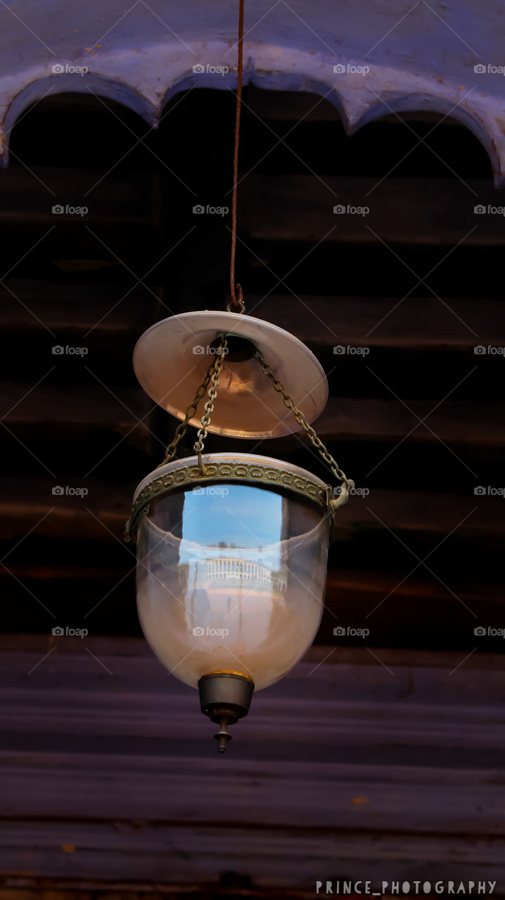 The beautiful antique lamp showing charm by reflecting Imambara Mosque in reflection.
Place:- Hooghly, India