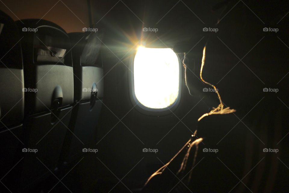 Sunlight through the plane window 