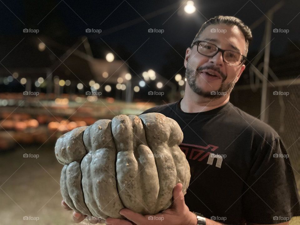 Brian holding a big gourd