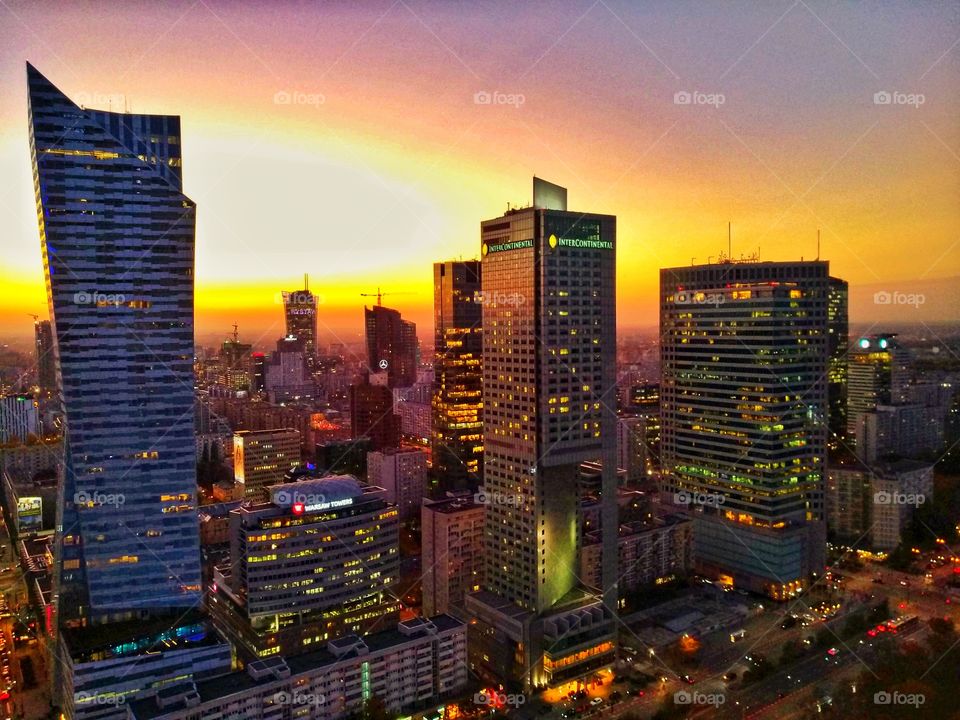 an aerial view of Warsaw skyline on an early autumn sunset