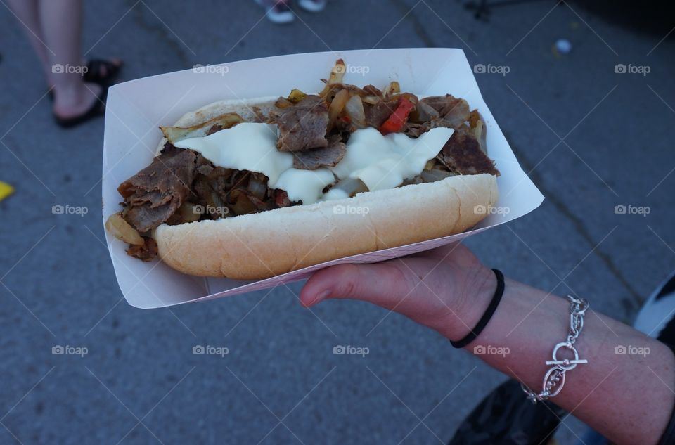 Close-up of women's hand holding food