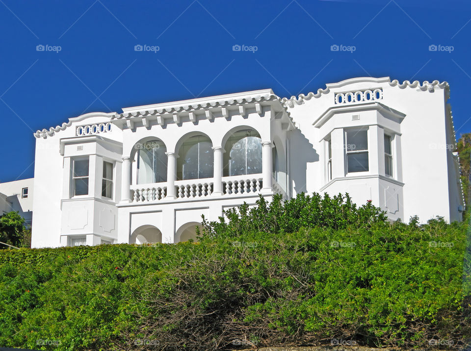 White mansion, balcony and pillars