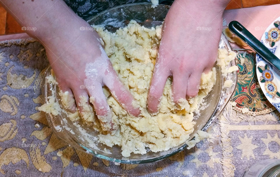 Mixing cake dough in a glass bowl