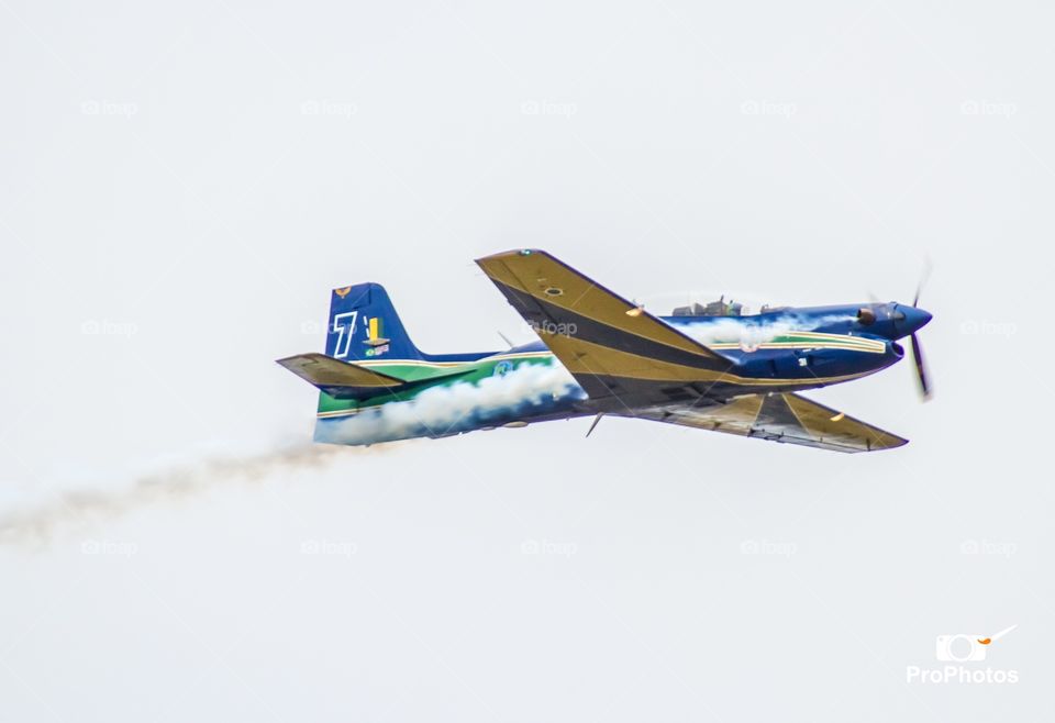 Air plane with a smoke trail 