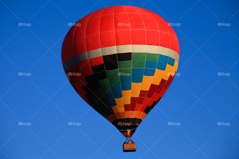 hot air baloon. multi coloured hot air baloon taking of in boituva