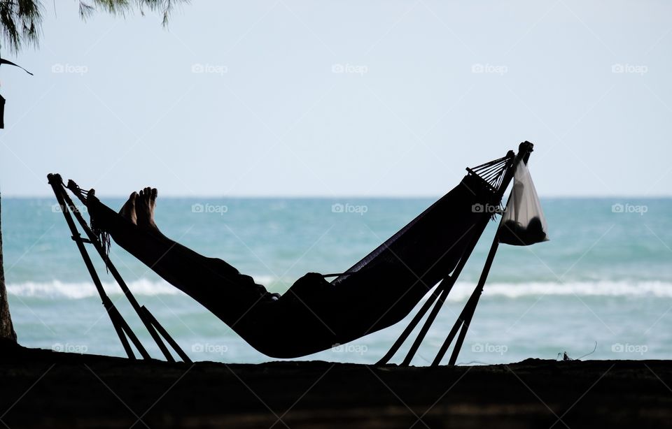 Tourist take summer time to relax on the beautiful beach in Thailand