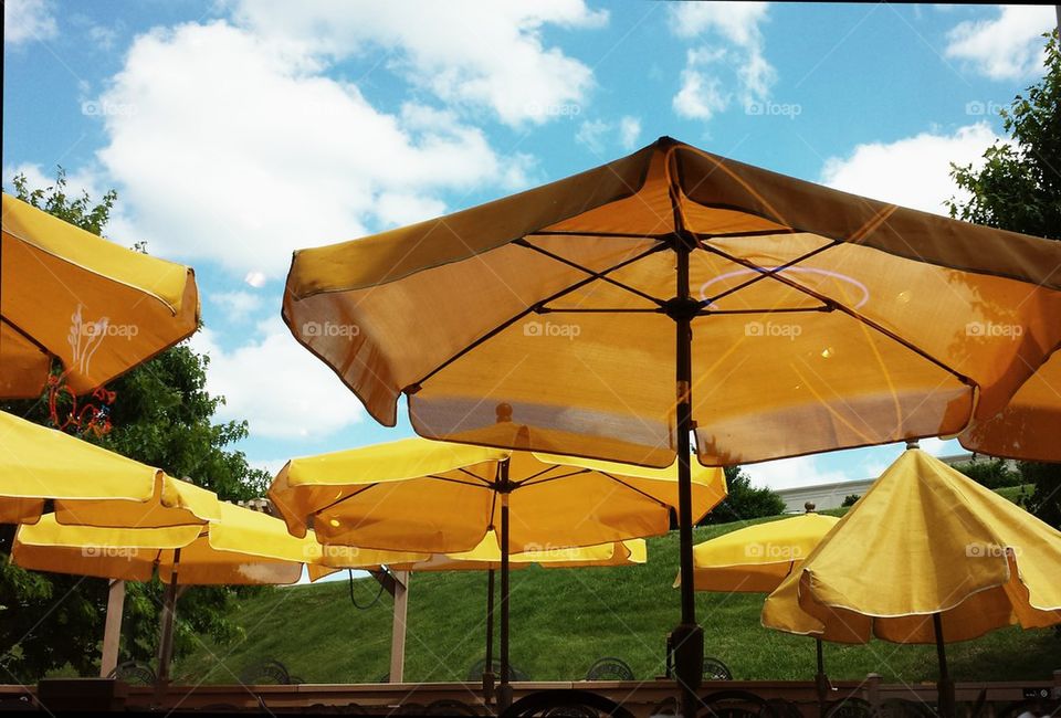 yellow umbrellas with blue