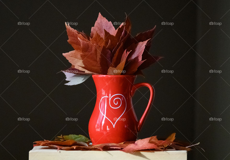 Autumn leaves in a vase