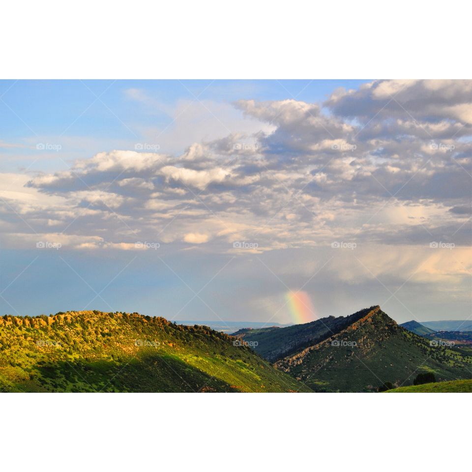 Rainbow at Dusk 1. Heading to Red Rocks amphitheater in Colorado with my parents to see a concert for the first time at this venue!