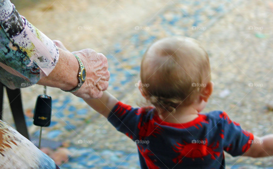 Boy walking with grandma