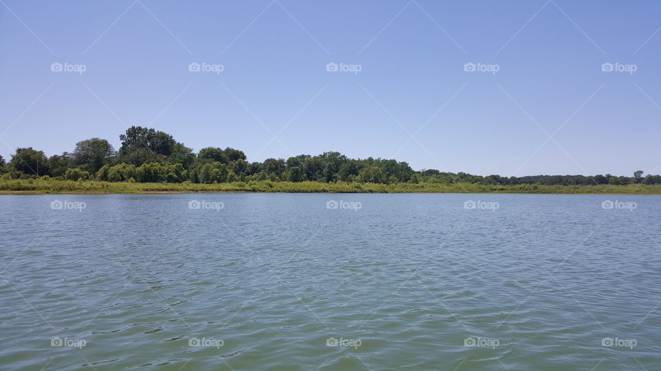 paddling on a blue bird day in Iowa