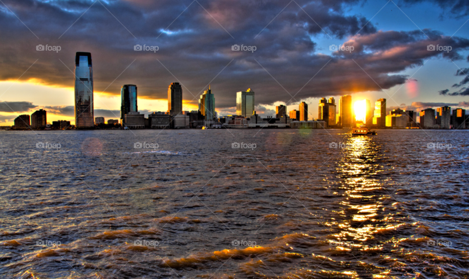 Skyline of a city during sunset