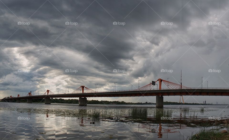 Bridge and stormy sky