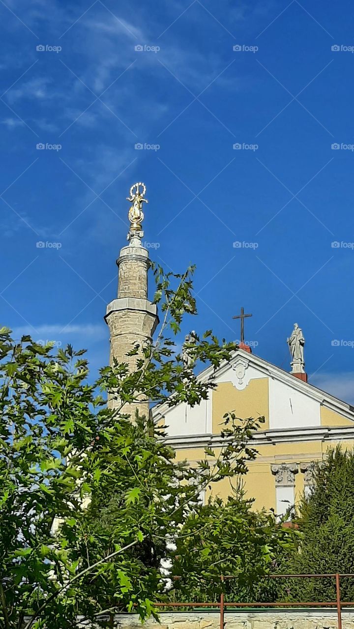 Church of Peter and Paul  golden Madonna on minaret