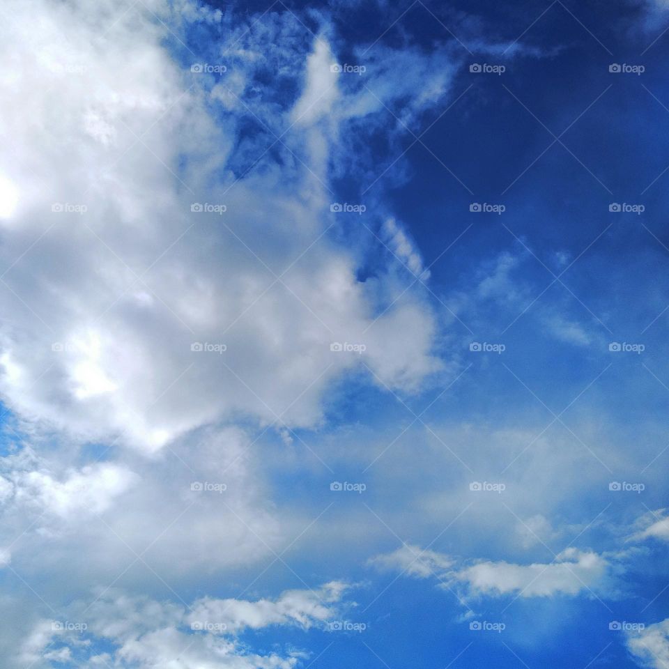 Blue sky, white clouds.