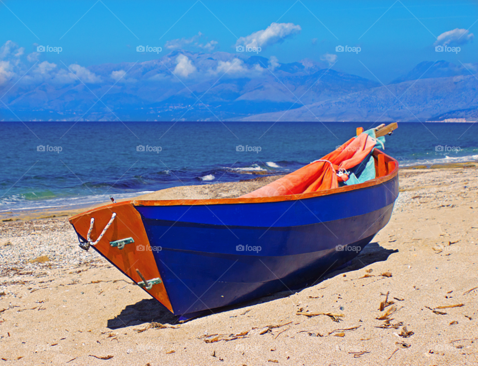 blue orange sand sea by jetandbarney